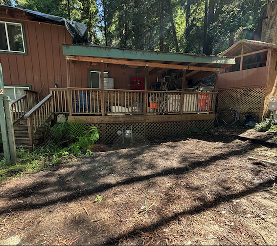 After view of the cleared area beside the porch